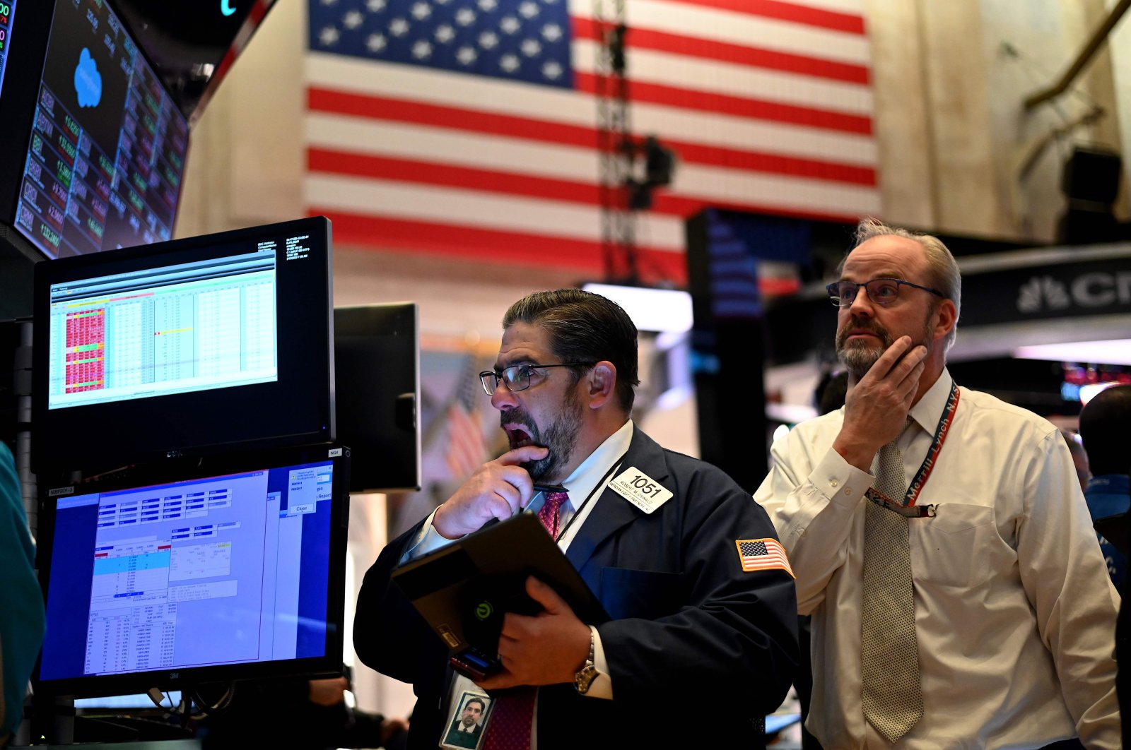 In this file photo taken on March 18, 2020 Traders work during the closing bell at the New York Stock Exchange (NYSE) at Wall Street in New York City. (AFP Photo)
