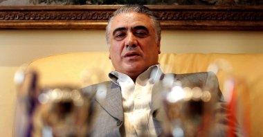 Former Real Madrid FC President Lorenzo Sanz poses with his trophies in Madrid, June 15, 2006. (AFP Photo)