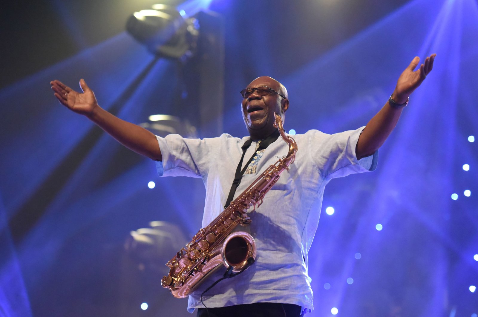 In this file photo taken on June 29, 2018, Manu Dibango performs during a concert at the Ivory Hotel in Abidjan. (AFP Photo)