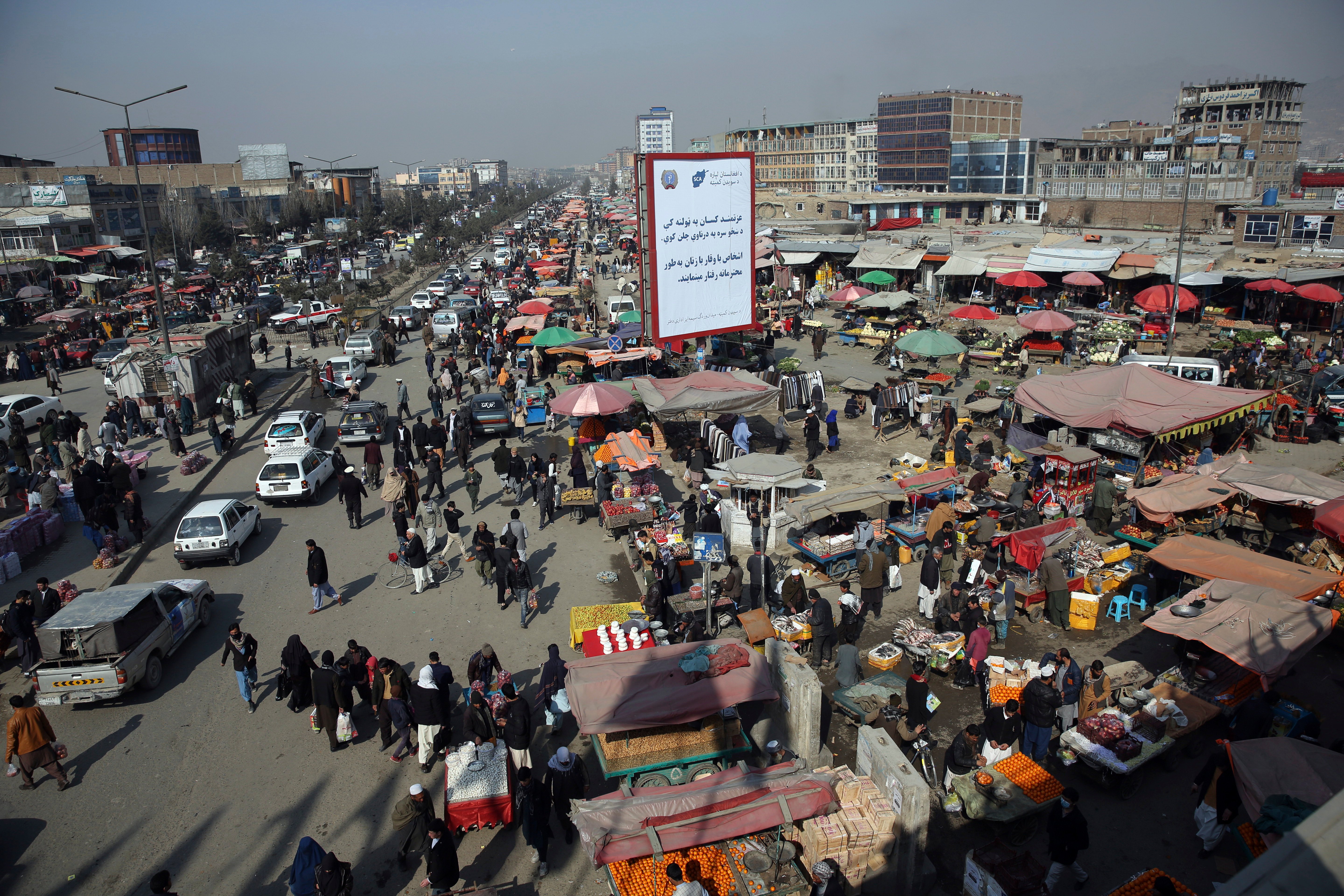An aerial view looks down. on a busy bazaar in Kabul, Feb. 22, 2020. (AP)