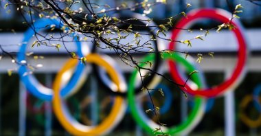 The Olympic rings are pictured at the entrance of the International Olympic Committee headquarters during the coronavirus outbreak in Lausanne, Switzerland, Tuesday, March 24, 2020. (Keystone via AP)