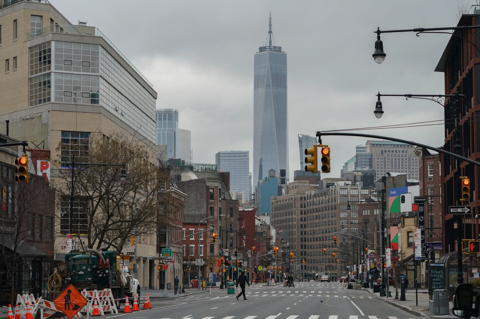 The World Trade Center rises over a nearly empty Seventh Avenue in the West Village, New York, Thursday, March 25, 2020.
