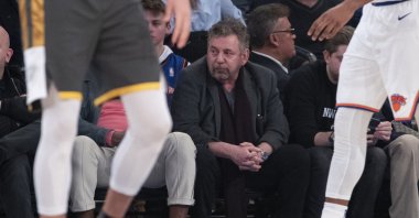 New York Knicks owner James Dolan (C) watches the first half of an NBA basketball game in New York, U.S.,  March 6, 2020. (AP Photo)