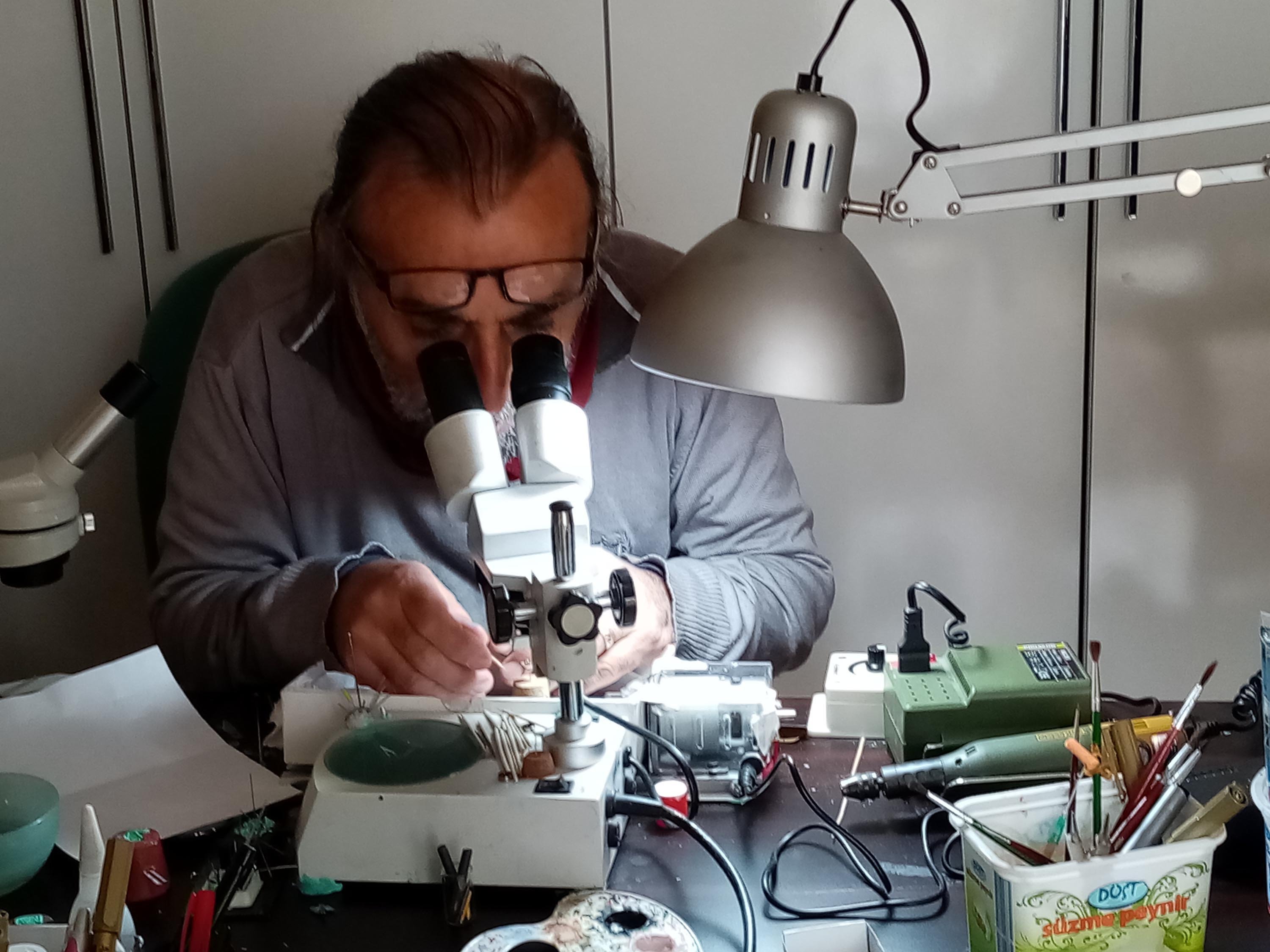Korkmaz, one of three microminiature artists in the world, has his own museum, where 40 of his works that only can be seen with a magnifying glass and microscope are represented.