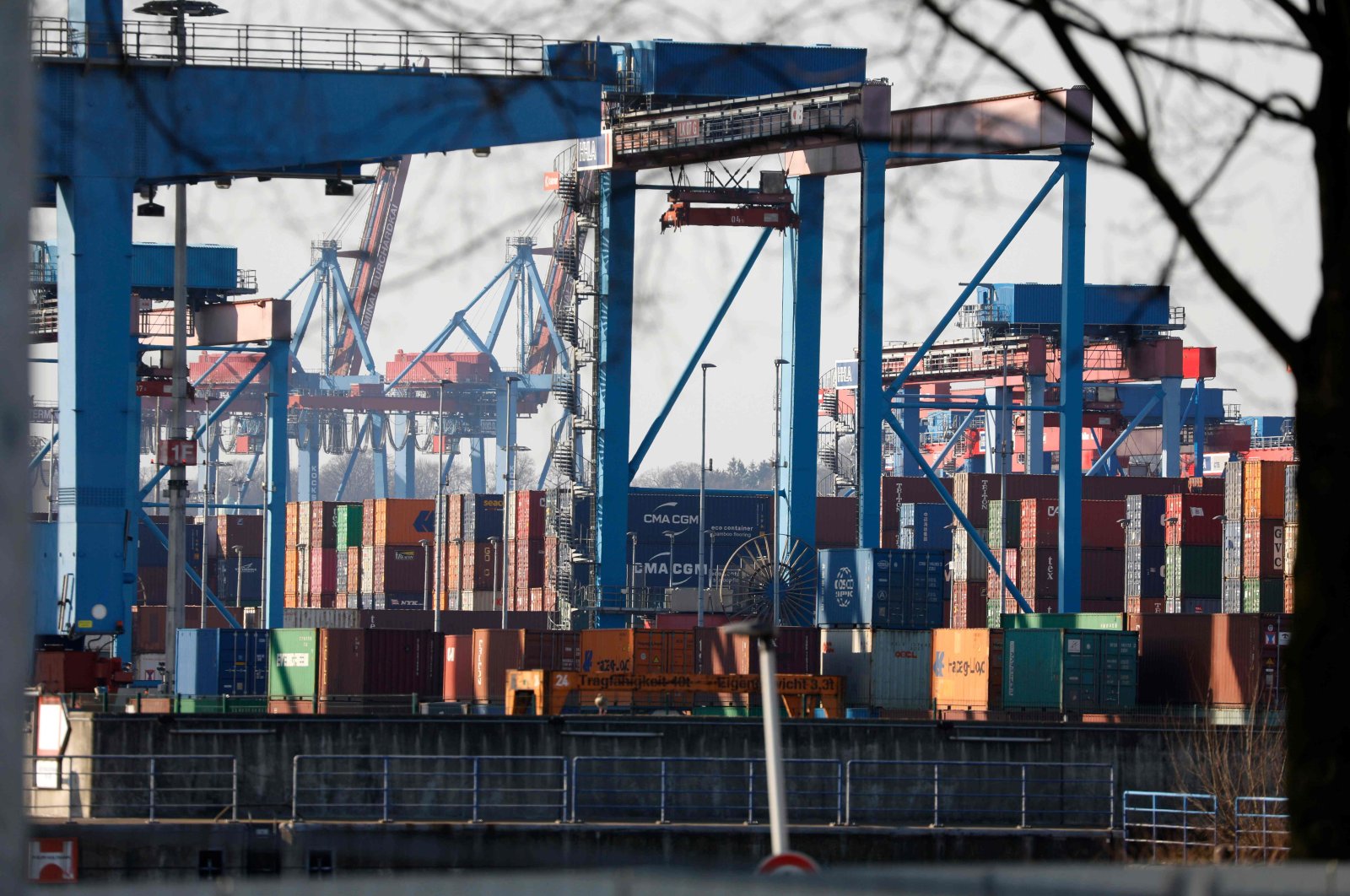 The container terminal Burchardkai in the harbor of the northern German city of Hamburg, Thursday, March 26, 2020. (AFP Photo)