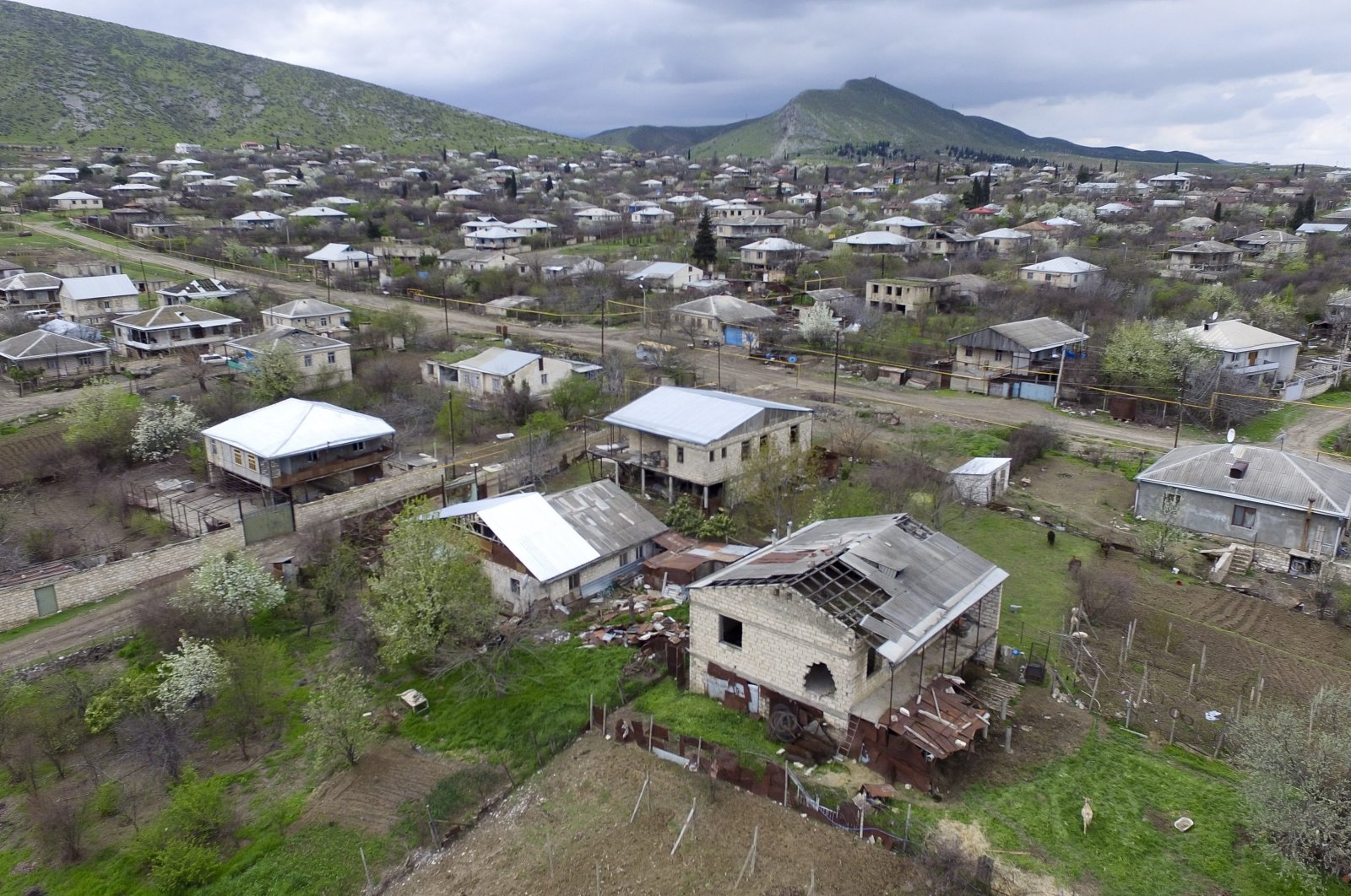 This aerial view shows houses damaged during the fighting in Martakert province in the separatist region of Nagorno-Karabakh, Azerbaijan, Monday, April 4, 2016. (AP Photo)