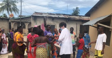 Yeşim Meço Davutoğlu (C) delivers sanitizers and soaps in an unknown location in Tanzania, Tuesday, March 31, 2020. (AA Photo)