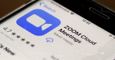 The icon of the videoconferencing app Zoom is displayed on an iPhone in Oestrich-Winkel, Germany, 01 April 2020. (EPA Photo)