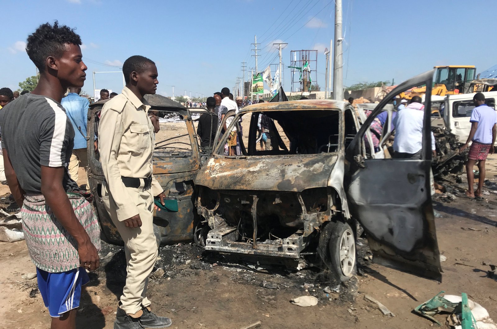 Somali security assesses the scene of a car bomb explosion at a checkpoint in Mogadishu, Somalia, Dec. 28, 2019. (Reuters Photo)