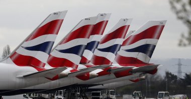 British Airways planes are seen parked at Terminal 5 at Heathrow Airport in London, Britain, March 18, 2020. (AP Photo)