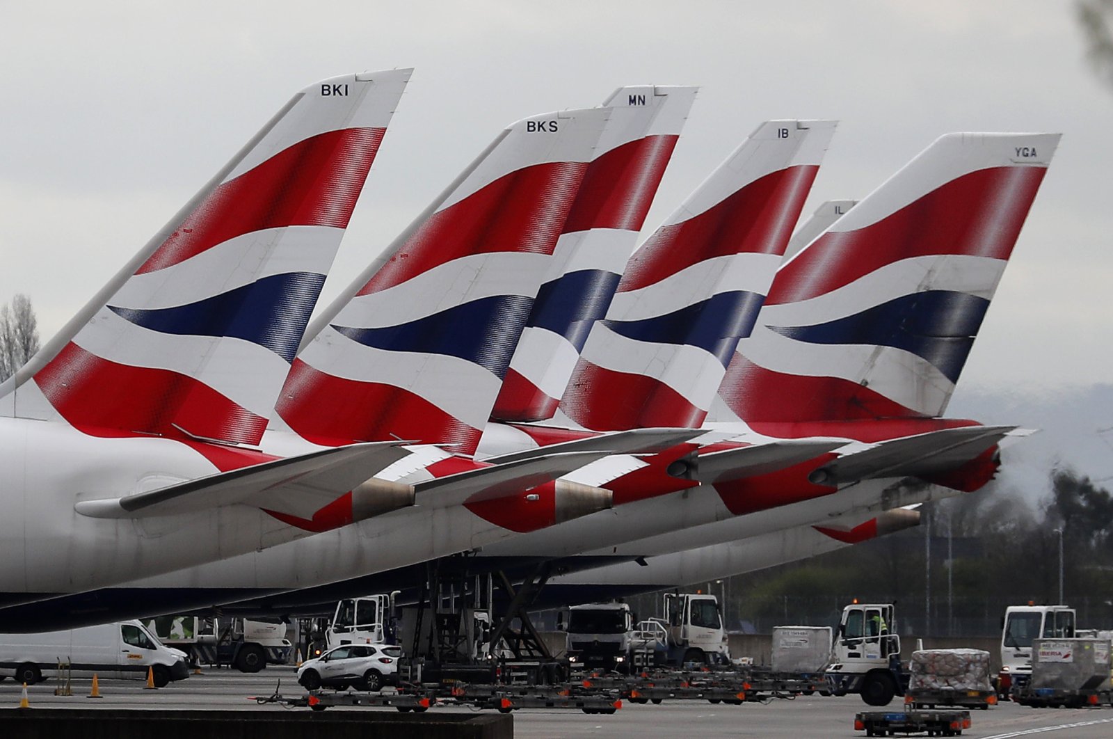 British Airways planes are seen parked at Terminal 5 at Heathrow Airport in London, Britain, March 18, 2020. (AP Photo)