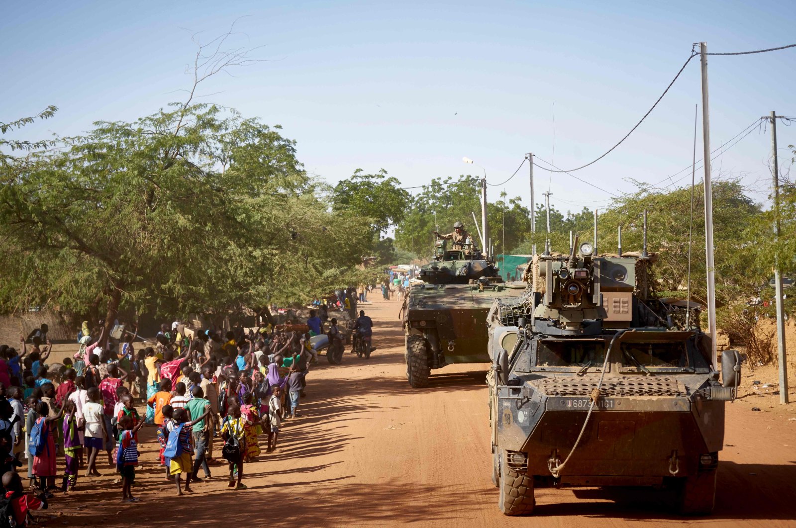 Soldiers of the French Army patrols the village Gorom Gorom in Armoured Personnel Carriers during the Barkhane operation in northern Burkina Faso, Nov.14, 2019. (AFP Photo)