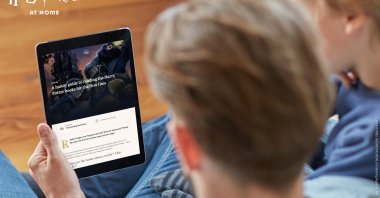 An undated handout photo shows tablet users looking a Harry Potter reading guide. J.K. Rowling has announced initiatives to help children, parents, carers and teachers confined at home during the coronavirus pandemic. (Reuters)