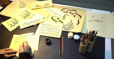 Islamic calligraphy is the artistic practice of handwriting and calligraphy based upon the alphabet in the lands sharing a common Islamic cultural heritage. (İHA Photo)