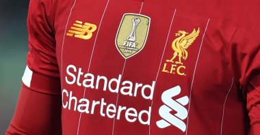 The emblem commemorating Liverpool's FIFA Club World Cup victory is seen on the shirt of defender Joe Gomez, during a Premier League football match, Liverpool, Dec. 29, 2019. (AFP Photo)