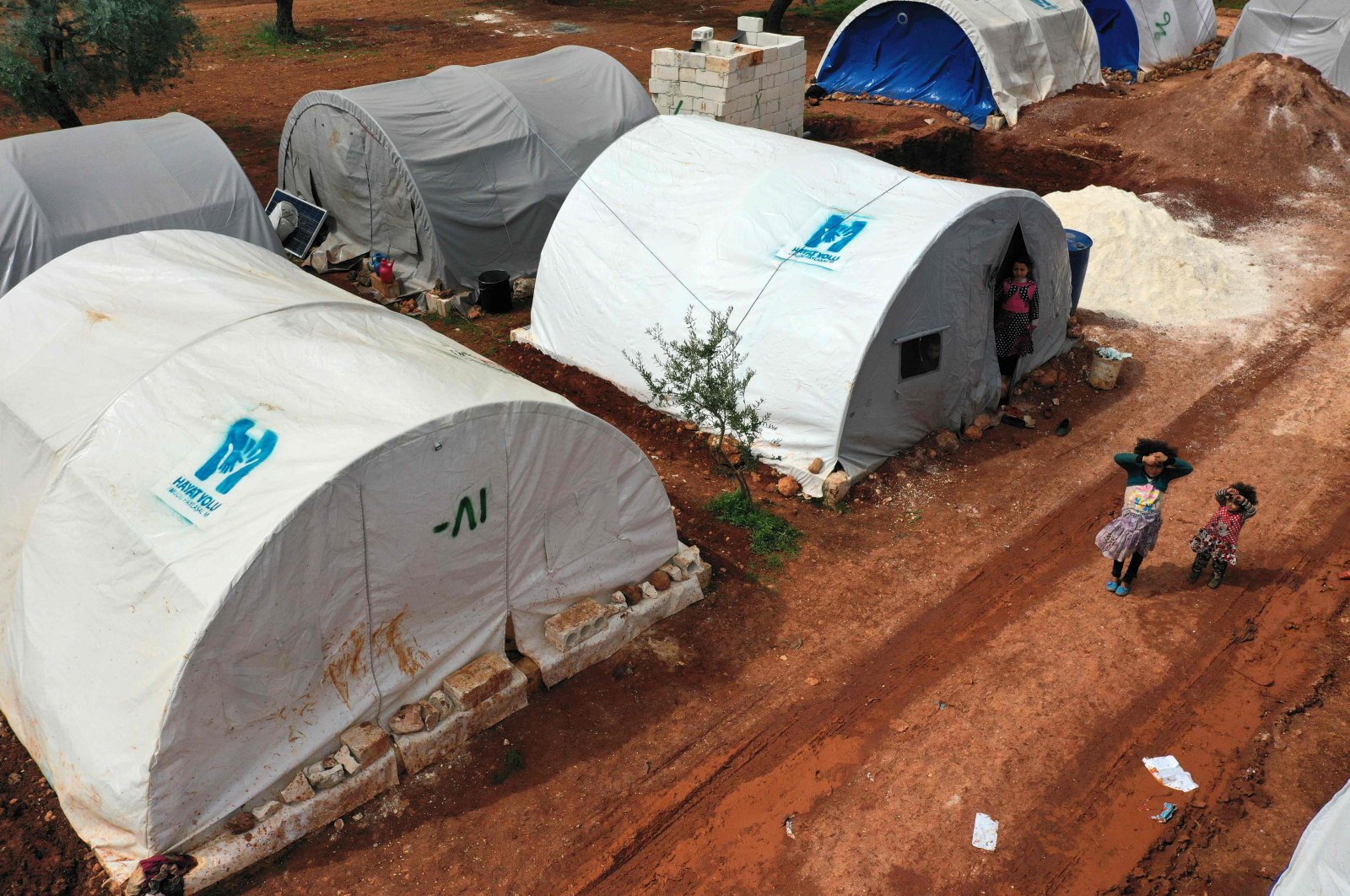 This picture taken on April 5, 2020 shows an aerial view of a camp for displaced Syrians from Idlib and Aleppo provinces, near the town of Maaret Misrin in Syria's northwestern Idlib province. (AFP Photo)