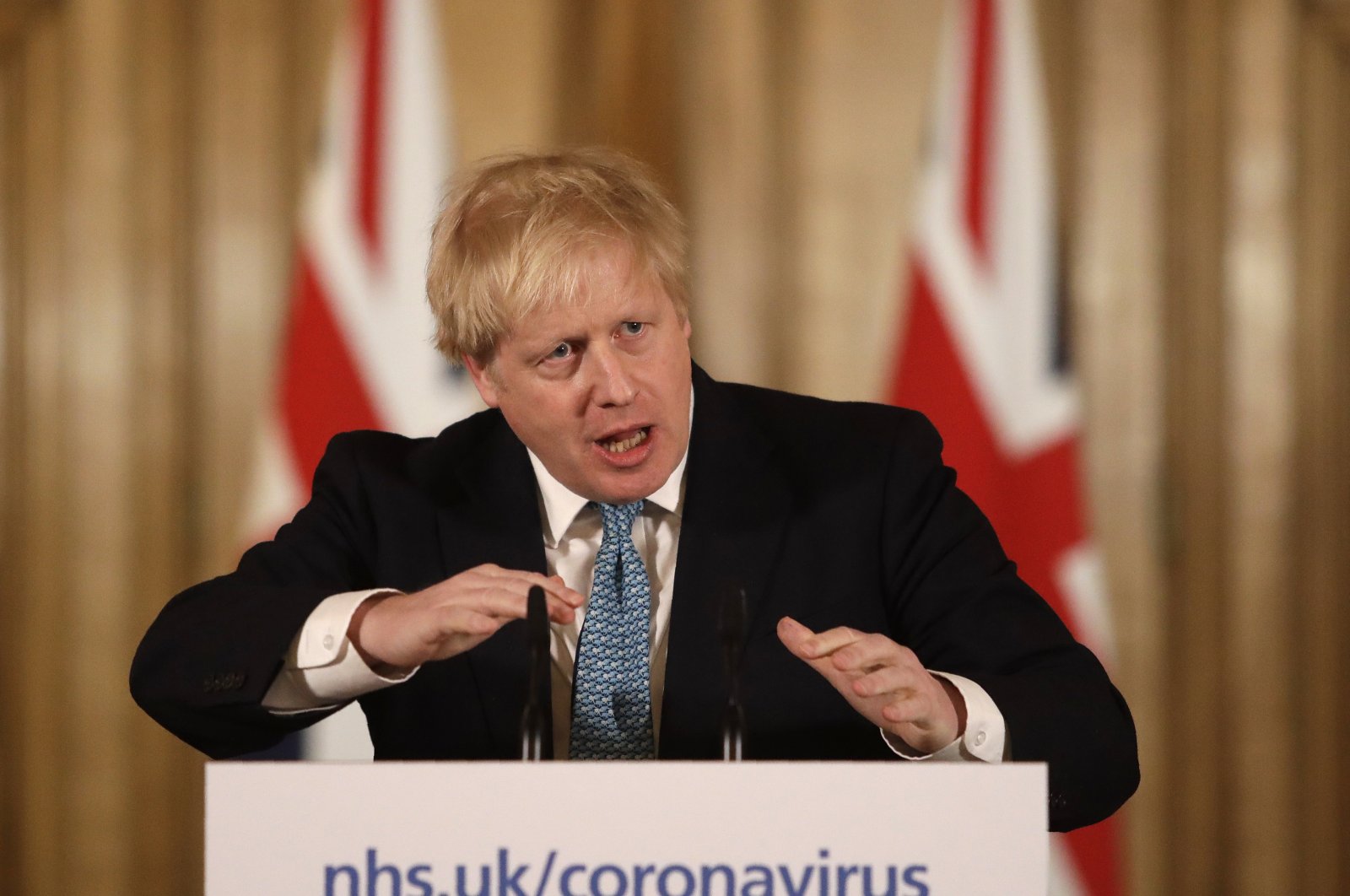 British Prime Minister Boris Johnson gestures as he gives a news conference about the ongoing situation with the COVID-19 outbreak, inside 10 Downing Street in London, U.K., March 17, 2020. (AP Photo)