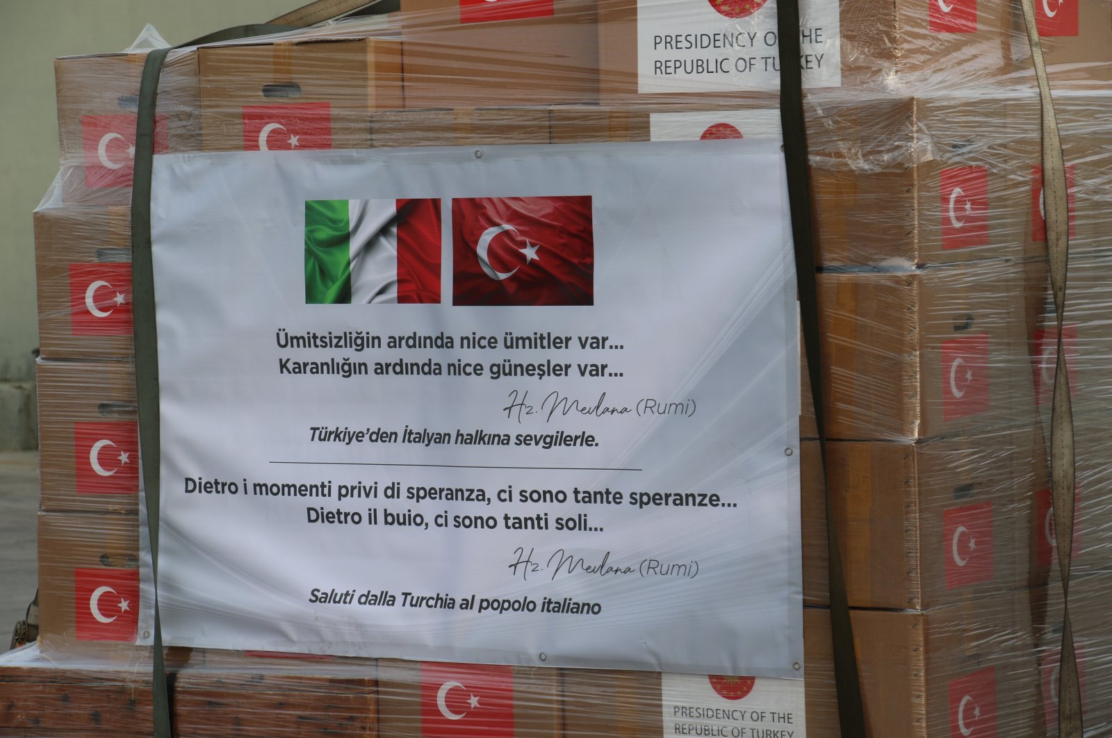 "There is hope after despair and many suns after darkness," a quote by the 13th-century Sufi mystic Mevlana Jalaluddin Rumi, is seen on a coronavirus aid package prepared by Turkish authorities to be delivered to Italy to help combat the pandemic, Ankara, Turkey, Wednesday, April 1, 2020. (İHA Photo)