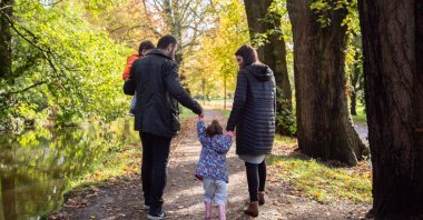 Abdullah Çelik and his family are having a walk in a park in Cardiff, U.K. (Photo by Sarah Steil)