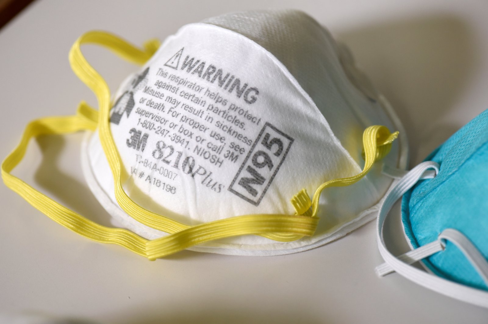 Various N95 respiration masks at a laboratory of 3M, that has been contracted by the U.S. government to produce extra marks in response to the country's novel coronavirus outbreak, in Maplewood, Minn., March 4, 2020. (Reuters Photo)