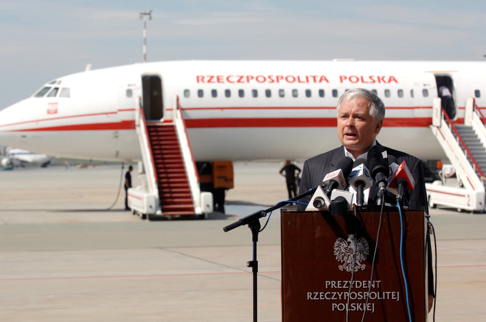 Polish President Lech Kaczynski speaks in front of the government Tupolev Tu-154 aircraft at Krakow airport, Poland, Aug. 8, 2008. (Reuters Photo)