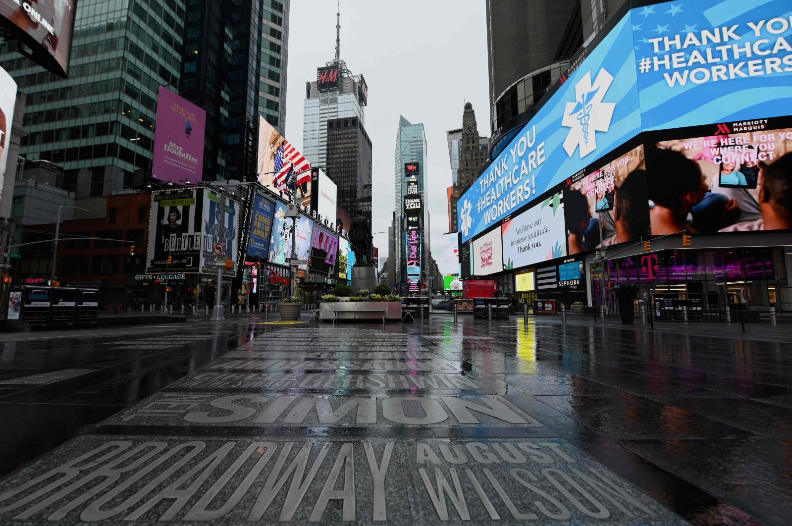 A view of a nearly empty Time Square on April 09, 2020 in New York City, as another 6.6 million US workers file for unemployment benefits for the week ending April 4, 2020. (AFP Photo)