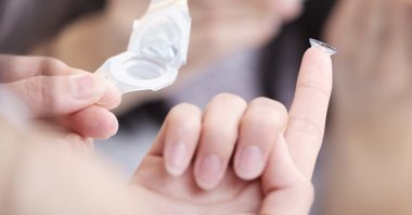 If you have to use contact lenses, you should be really careful about hygiene. (iStock Photo)