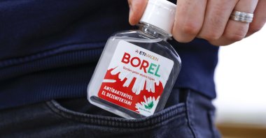 A man holds a hand sanitizer produced by the Energy and Natural Resources Ministry, Sunday, April 12, 2020. (AA Photo)