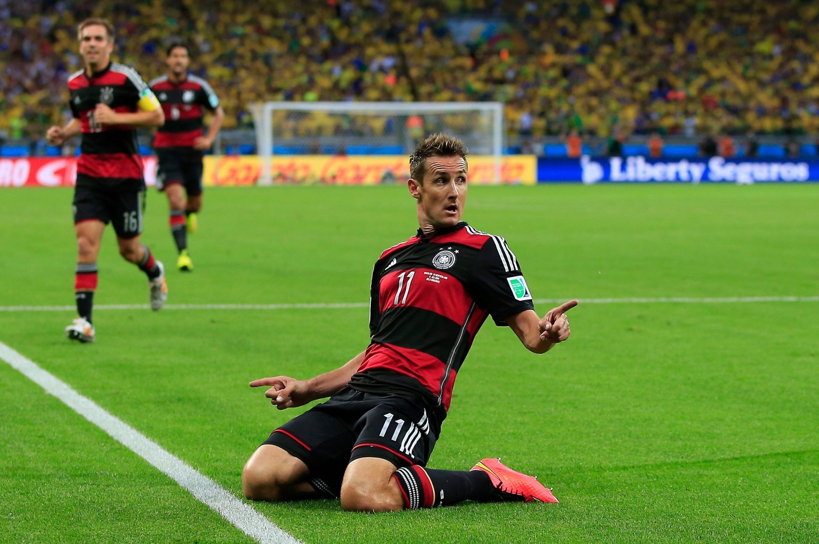 Miroslav Klose celebrates after scoring during the semi-final football match between Brazil and Germany, in Belo Horizonte, Brazil, July 8, 2014. (AFP Photo)