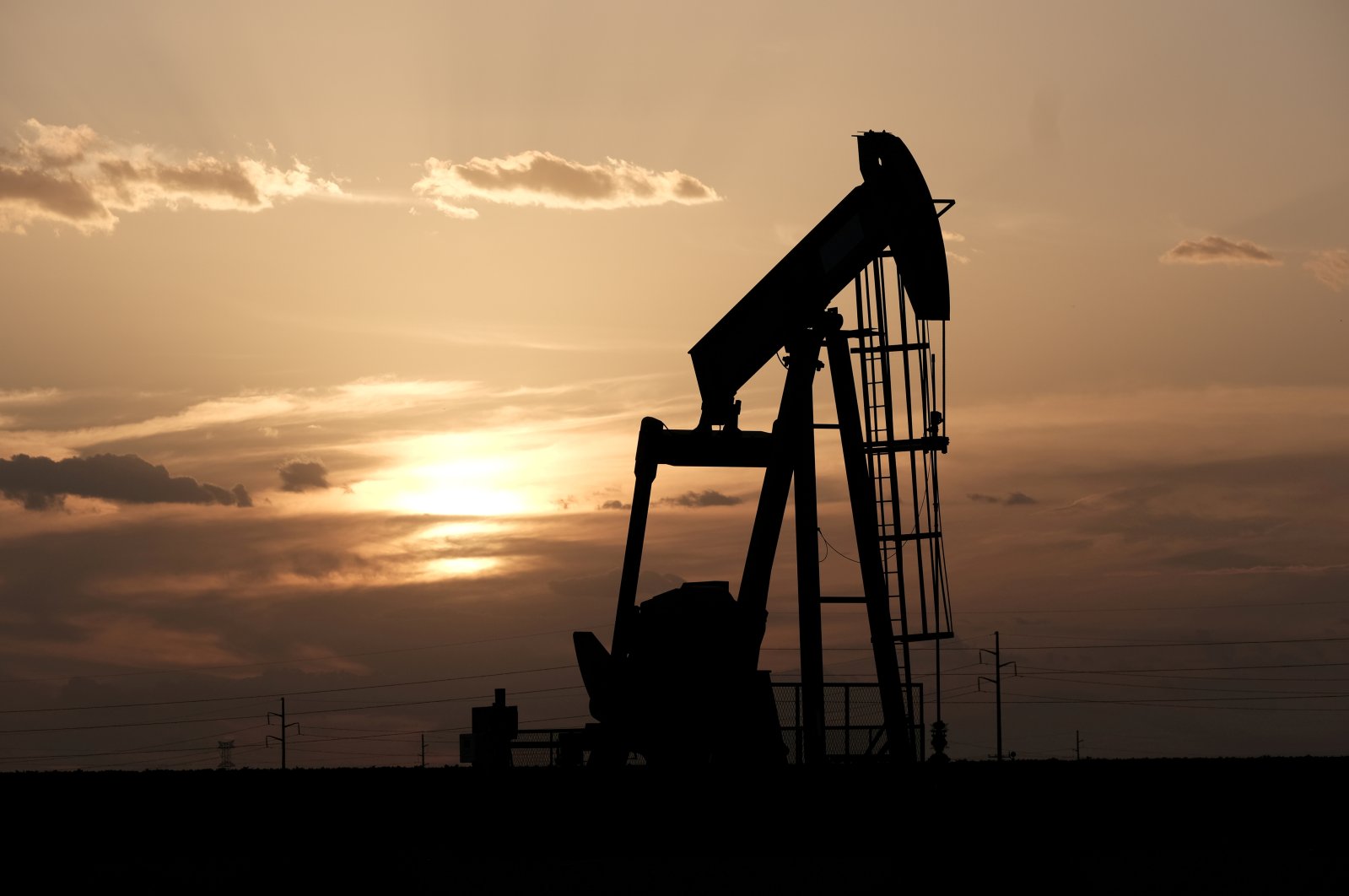 Oil pump jacks work at sunset near Midland, Texas, U.S., Aug. 21, 2019. (Reuters Photo)