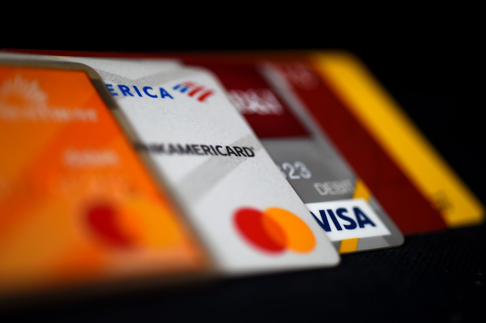 This picture shows debit and credit cards arranged on a desk in Arlington, Virginia, U.S., April 6, 2020. (AFP Photo)