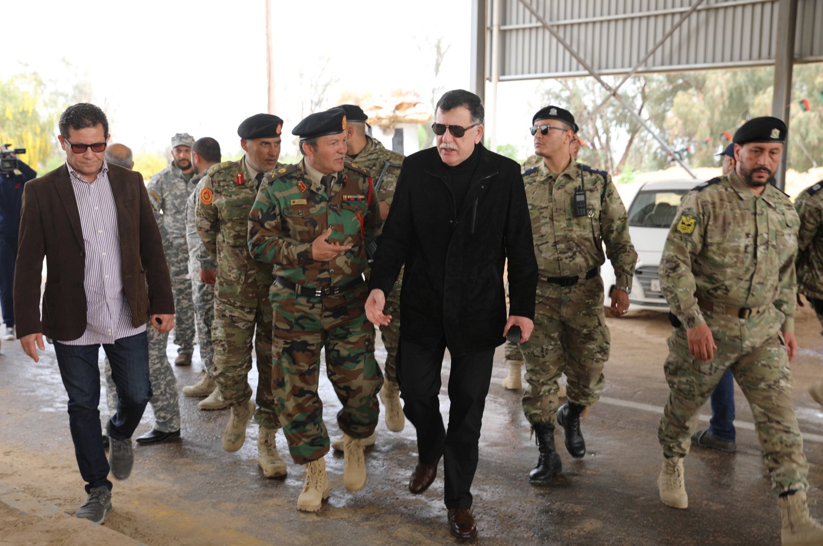 Libyan Prime Minister Fayez al-Sarraj arrives at a checkpoint after Government of National Accord (GNA) forces retook it from Khalifa Haftar-aligned militias, west of Tripoli, Libya, April 5, 2019. (Reuters Photo)