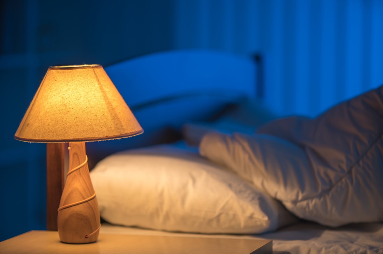An earlier bedtime could help us shrink our carbon footprint. (iStock Photo)
