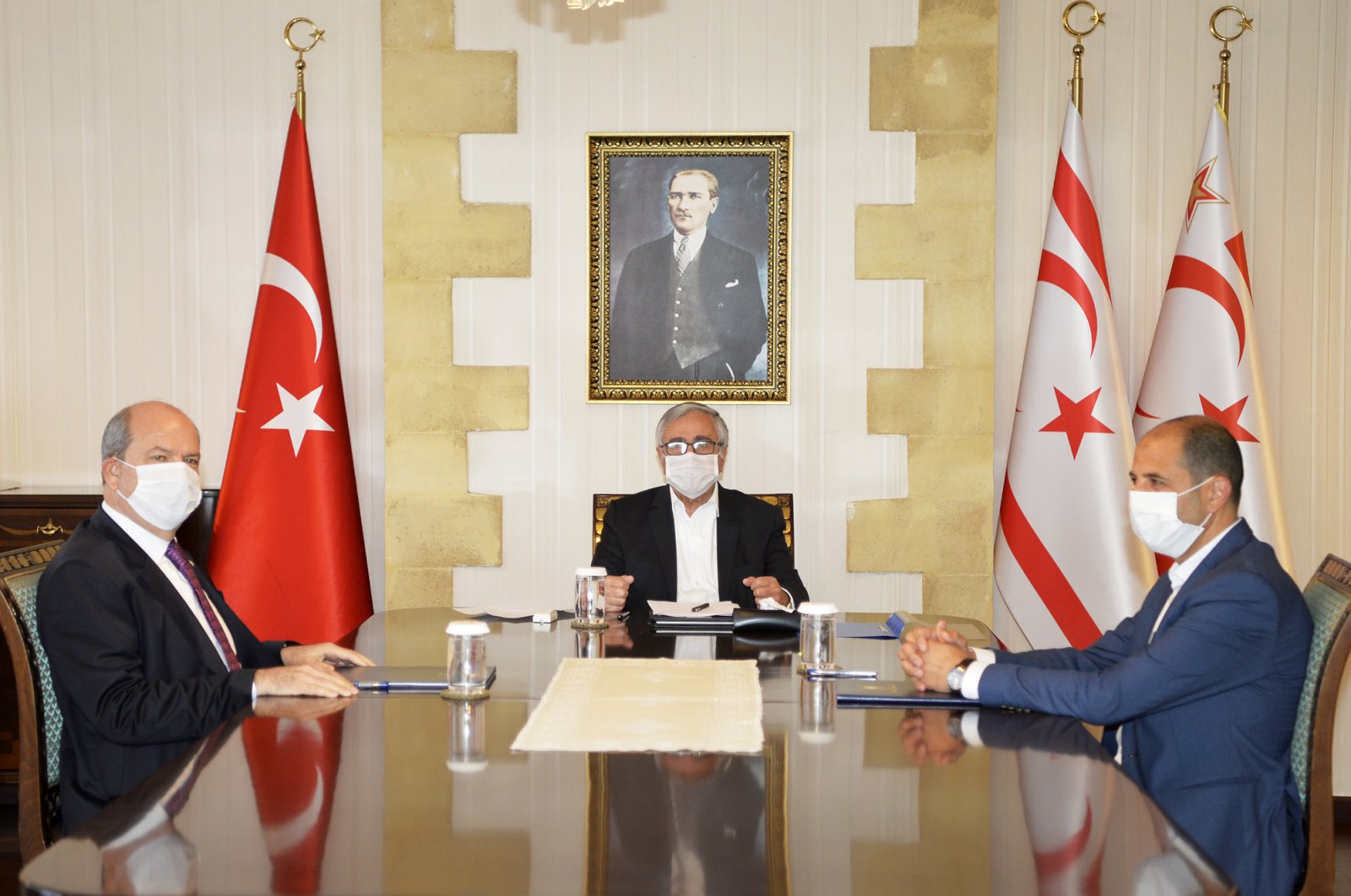 TRNC President Mustafa Akıncı (Center) holds meeting with Prime Minister Ersin Tatar and Foreign Minister Kudret Özersay to discuss developments regarding coronavirus outbreak on April 9, 2020. (AA Photo)