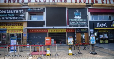 A deserted mall and an African restaurant are seen in Guangzhou, Guangdong province, China, April 13, 2020. (EPA Photo)
