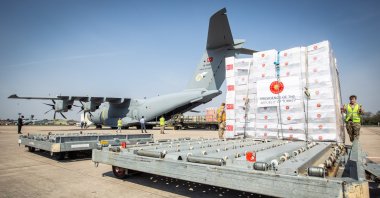 Crucial supplies of personal protective equipment (PPE) for medical staff are delivered from Turkey into a Royal Air Force base for distribution around the country, amid the coronavirus outbreak, in Carterton, Britain, April 10, 2020. (Reuters Photo)