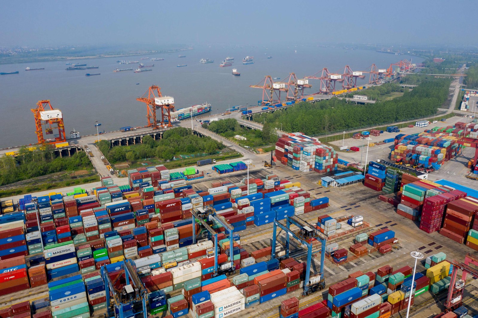 Containers are seen at the port in Wuhan, on the Yangtze river, in China's central Hubei province, April 12, 2020. (AFP Photo)