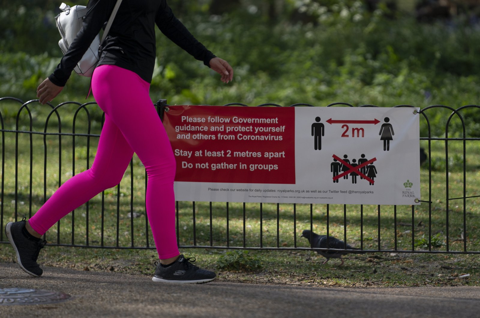 A general view of signage in St James Park, Central London Britain, Monday, April 13, 2020. (EPA Photo)