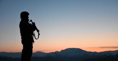 A member of the Turkish Armed Forces (TSK) on guard at an undisclosed location, March 26, 2020. (AA Photo)