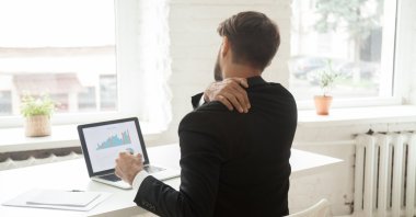 When you are tired after long working hours in front of the computer, little exercises like shoulder rolls can ease your muscles. (iStock Photo)
