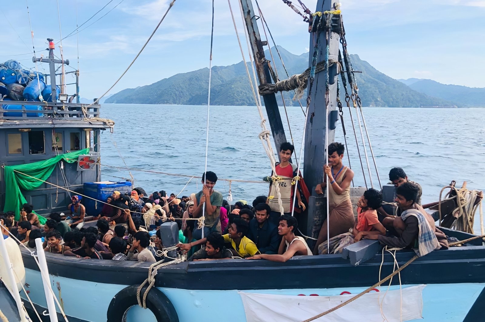 A wooden boat carries suspected Rohingya migrants detained in Malaysian territorial waters off the island of Langkawi, Malaysia, April 5, 2020. (Malaysian Maritime Enforcement Agency via AP)