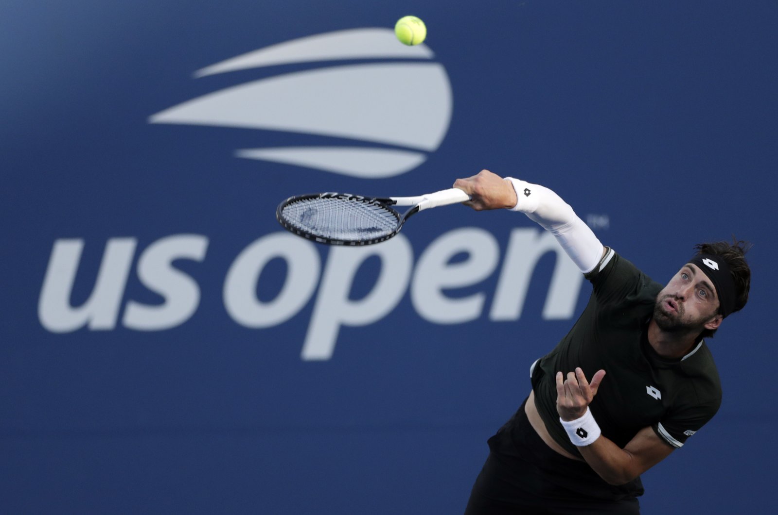 Nikoloz Basilashvili serves to Dominik Koepfer during the third round of the U.S. Open in New York, Aug. 30, 2019. (AP Photo) 