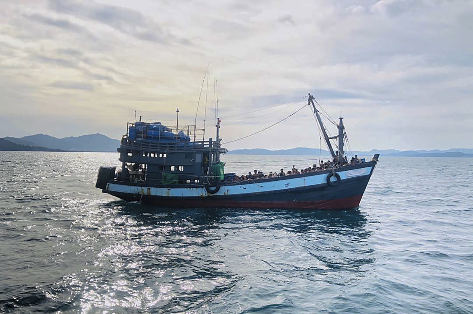 A wooden boat carrying suspected Rohingya migrants are detained in Malaysian territorial waters off the island of Langkawi, in the state of Kedah, Malaysia, April 5, 2020. (EPA Photo)