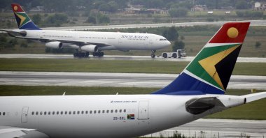 A South African Airways (SAA) plane is towed at O.R. Tambo International Airport in Johannesburg, South Africa, January 18, 2020. (REUTERS Photo)