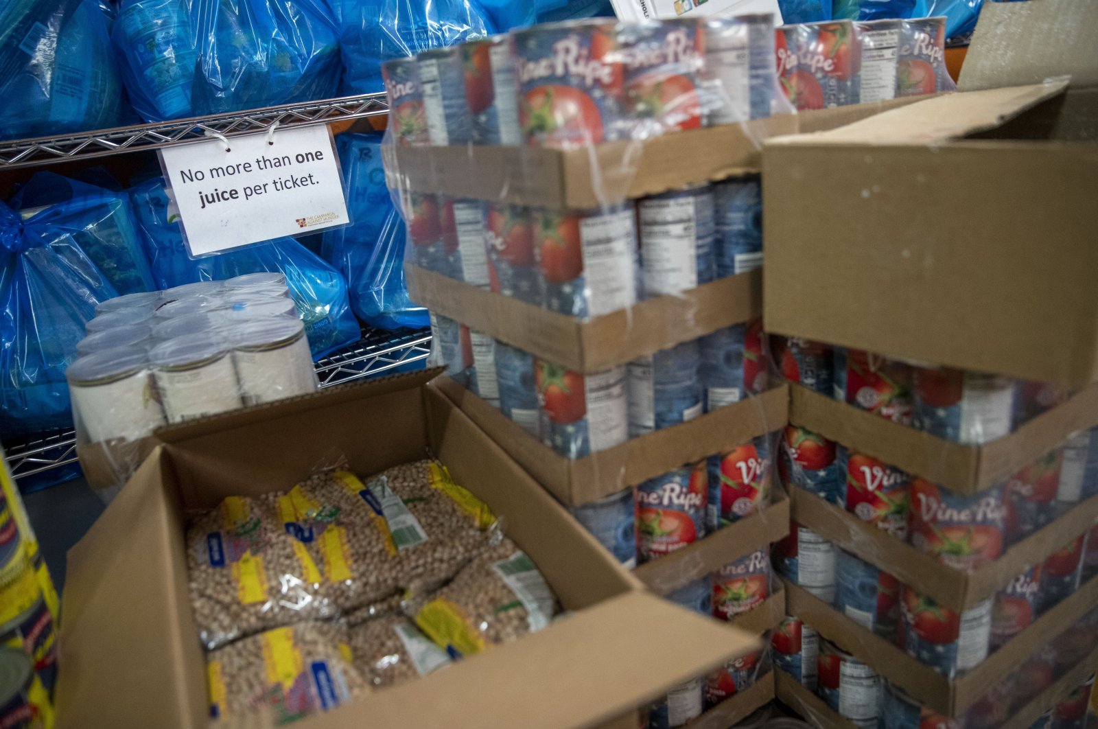Groceries are stacked in a storage area at The Campaign Against Hunger food pantry, Thursday, April 16, 2020, in the Bedford-Stuyvesant neighborhood of the Brooklyn borough of New York. (AP Photo)