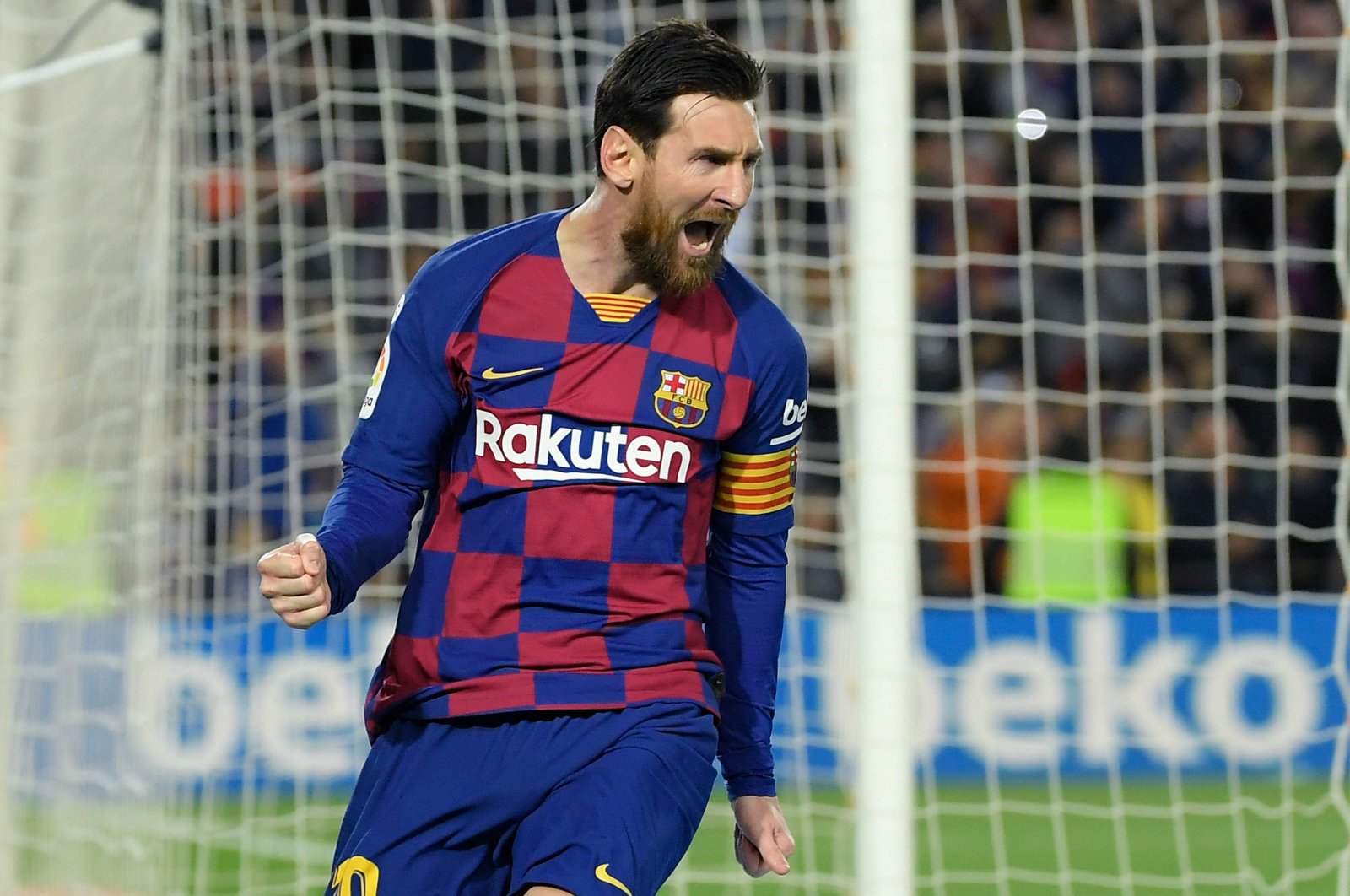 Barcelona's Argentine forward Lionel Messi celebrates after scoring a goal during the Spanish league football match between FC Barcelona and Real Sociedad at the Camp Nou stadium in Barcelona, Spain on March 7, 2020. (AFP Photo)