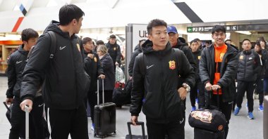 Players of the Chinese Super League team Wuhan Zall arrive at the Atocha train station in Madrid, Spain, Saturday, Feb. 29, 2020. (AP Photo)