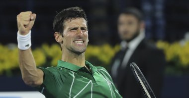 Novak Djokovic celebrates after he beating Stefanos Tsitsipas in the final match of the Dubai Duty Free Tennis Championship in Dubai, United Arab Emirates, Feb. 29, 2020. (AP Photo)
