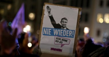 People attend a demonstration as supporters of the right-wing anti-Islam movement Patriotic Europeans Against the Islamisation of the West (PEGIDA) stage a protest in Dresden, Germany, Feb. 17, 2020. The banner reads: "Never again. No stage for the AfD." (Reuters Photo)
