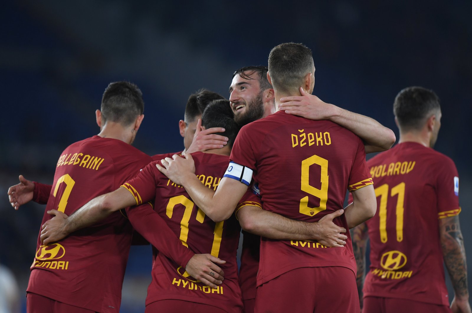 Henrikh Mkhitaryan celebrates scoring AS Roma's second goal against Lecce with Bryan Cristante and teammates, Stadio Olimpico, Rome, Italy, Feb. 23, 2020. (Reuters Photo) 